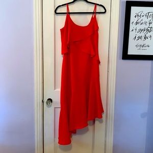 Red dress with an asymmetrical bottom
